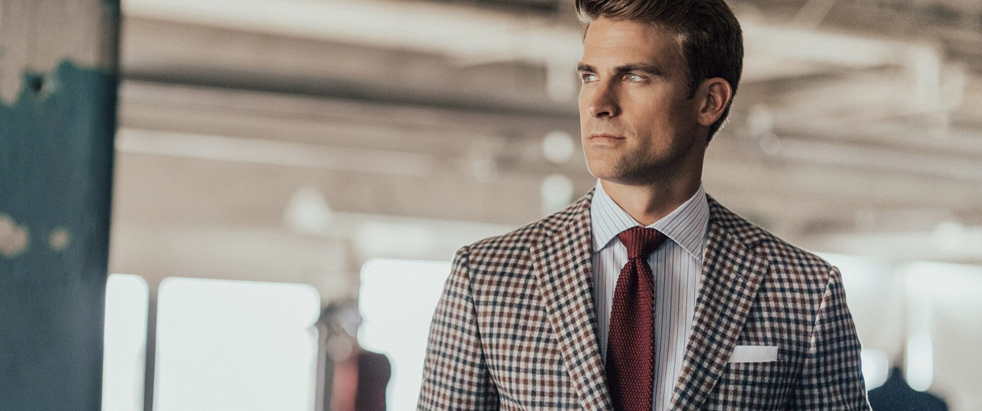 Edward's Men's Wear Collections: Male model in suit.